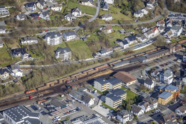 Aerial view, timber transport and loading at Sundern station, Sundern, Sauerland, North Rhine-Westphalia, Germany, railway tracks, railway station, DE, Deutsche Bahn AG, Europe, freight, freight transport, freight traffic, main station, aerial view, aerial photography, aerial photography, overview, bird's-eye view, overview