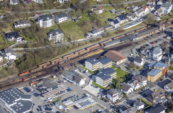 Aerial view, timber transport and loading at Sundern station, Sundern, Sauerland, North Rhine-Westphalia, Germany, railway tracks, railway station, DE, Deutsche Bahn AG, Europe, freight, freight transport, freight traffic, main station, aerial view, aerial photography, aerial photography, overview, bird's-eye view, overview