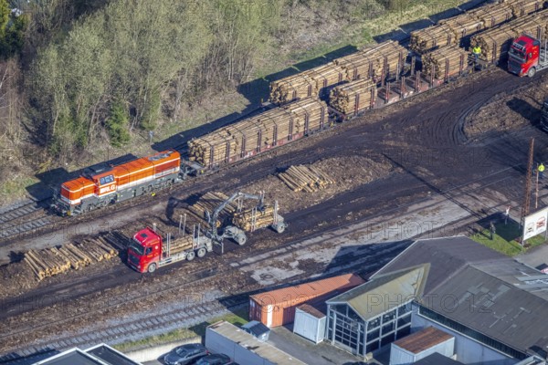 Aerial photo, timber transport and loading at Sundern station, Sundern, Sauerland, North Rhine-Westphalia, Germany, railway tracks, station, DE, Deutsche Bahn AG, Europe, goods, freight transport, freight traffic, main station, aerial photo, aerial photography, aerial photography, overview, bird's-eye view, birds-eyes view, overview, spruce dieback, bark beetle plague, bark beetle damage, dead spruce, spruce clear-cut, clear-cutting, damaged wood