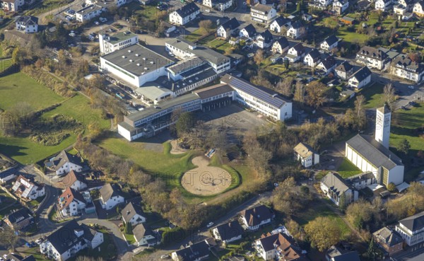 Aerial view, secondary school and Christkönigkirche in Sundern, Sauerland, North Rhine-Westphalia, Germany, place of worship, education, educational institution, DE, Europe, religious community, place of worship, secondary school, holy place, church, parish, denomination, educational institute, aerial view, aerial photography, aerial photography, religion, religious site, school, Sundern, overview, bird's eye view, birds-eyes view, overview