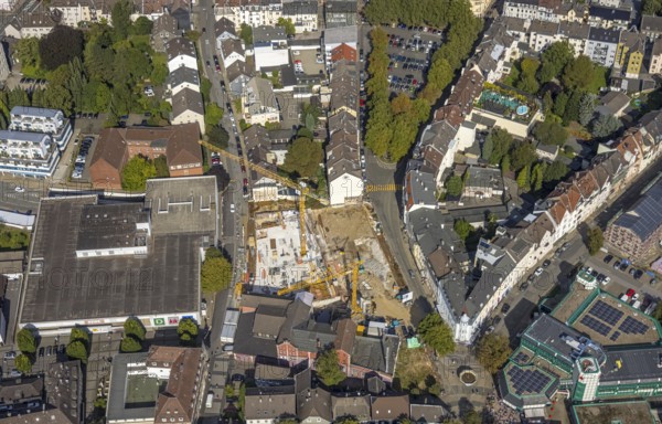 Aerial view, construction site and new building between Neumarkt and Schulstraße in Schwelm, Ruhr area, North Rhine-Westphalia, Germany, construction work, construction area, construction site, building plots, construction crane, construction project, construction site, DE, Europe, aerial view, aerial photography, aerial photography, new building, Schwelm, overview, bird's-eye view, overview