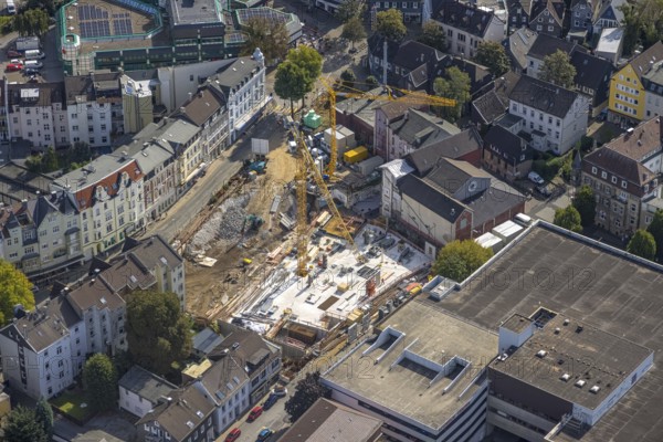 Aerial view, construction site and new building between Neumarkt and Schulstraße in Schwelm, Ruhr area, North Rhine-Westphalia, Germany, construction work, construction area, construction site, building plots, construction crane, construction project, construction site, DE, Europe, aerial view, aerial photography, aerial photography, new building, Schwelm, overview, bird's-eye view, overview