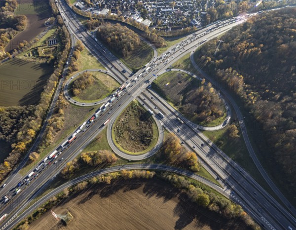 Aerial view, Westhofener Kreuz of the A1 motorway and A45 motorway in the Westhofen district of Schwerte, Ruhr area, North Rhine-Westphalia, Germany, motorway, motorway bridge, motorway junction, DE, Europe, shapes and colours, aerial view, aerial photography, aerial photography, Schwerte, traffic jam, road traffic, road traffic, overview, traffic volume, traffic jam, bird's eye view, birds-eyes view, overview