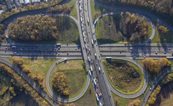Aerial view, Westhofener Kreuz of the A1 motorway and A45 motorway in the Westhofen district of Schwerte, Ruhr area, North Rhine-Westphalia, Germany, motorway, motorway bridge, motorway junction, DE, Europe, shapes and colours, aerial view, aerial photography, aerial photography, Schwerte, traffic jam, road traffic, road traffic, overview, traffic volume, traffic jam, bird's eye view, birds-eyes view, overview