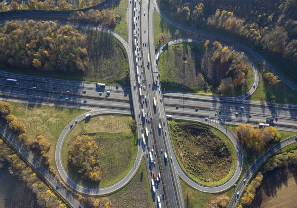 Aerial view, Westhofener Kreuz of the A1 motorway and A45 motorway in the Westhofen district of Schwerte, Ruhr area, North Rhine-Westphalia, Germany, motorway, motorway bridge, motorway junction, DE, Europe, shapes and colours, aerial view, aerial photography, aerial photography, Schwerte, traffic jam, road traffic, road traffic, overview, traffic volume, traffic jam, bird's eye view, birds-eyes view, overview
