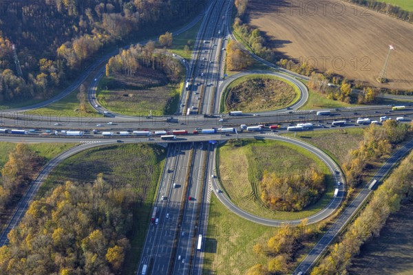 Aerial view, Westhofener Kreuz of the A1 motorway and A45 motorway in the Westhofen district of Schwerte, Ruhr area, North Rhine-Westphalia, Germany, motorway, motorway bridge, motorway junction, DE, Europe, shapes and colours, aerial view, aerial photography, aerial photography, Schwerte, traffic jam, road traffic, road traffic, overview, traffic volume, traffic jam, bird's eye view, birds-eyes view, overview