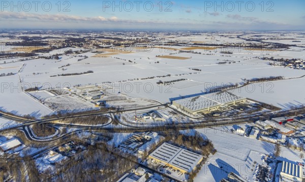 Aerial view, new construction - construction site in the industrial area - industrial area Wasserfuhr along the Opmünder Weg at the federal road B475, snow, winter, Soest, Soester Börde, North Rhine-Westphalia, Germany, Soester, Börde, DE, Europe, birds-eyes, view, aerial view, aerial photography, aerial photography, overview, overview, bird's eye view, winter weather, winter onset, cold, B475, industrial area, industry, manufacturing, production, trade, economy, commercial enterprise, trade, transport, traffic, infrastructure, logistics, road traffic