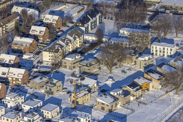 Aerial view, Belgian Quarter Soest, new construction of flats and terraced houses, former Belgian barracks BEM Adam, snow, winter, Jakobi, Soest, Soester Börde, North Rhine-Westphalia, Germany, Soester, Börde, DE, Europe, birds-eyes, view, aerial photography, aerial photography, aerial photography, overview, overview, bird's eye view, winter weather, winter onset, cold, residential neighbourhood, former, barracks, housing, flat, houses, residential buildings, housing estate, settlement