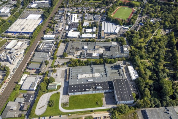 Aerial view, commercial area In der Graslake and sports ground Jesinghauser Straße of the Spielvereinigung Linderhausen.in the district Öhde in Schwelm, Ruhr area, North Rhine-Westphalia, Germany, DE, Europe, football pitch, football stadium, commercial enterprises, commercial area, commercial park, commercial location, commercial use, industrial area, industrial building, industrial location, aerial view, aerial photography, aerial photography, aerial photography, Schwelm, sports facilities, sports ground, sports facility, overview, bird's eye view, overview