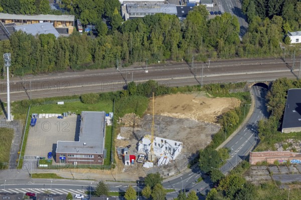 Aerial view, construction site Red Cross Am Ochsenkamp next to the Technical Relief Organisation Schwelm in Schwelm, Ruhr area, North Rhine-Westphalia, Germany, construction work, construction area, building site, building plots, construction project, construction site, DE, Europe, aerial view, aerial photography, aerial photography, new building, Schwelm, overview, bird's-eye view, overview