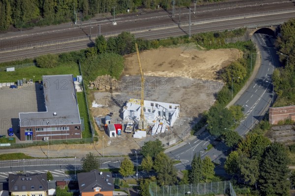 Aerial view, construction site Red Cross Am Ochsenkamp next to the Technical Relief Organisation Schwelm in Schwelm, Ruhr area, North Rhine-Westphalia, Germany, construction work, construction area, building site, building plots, construction project, construction site, DE, Europe, aerial view, aerial photography, aerial photography, new building, Schwelm, overview, bird's-eye view, overview