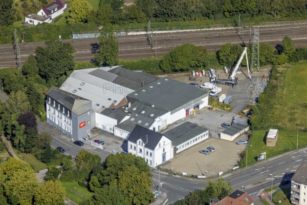 Aerial view, company premises of EQOS Energie Deutschland GmbH in Schwelm, Ruhr area, North Rhine-Westphalia, Germany, DE, Europe, commercial enterprises, commercial area, commercial area, commercial location, commercial use, aerial photograph, aerial photography, aerial photography, Schwelm, overview, bird's eye view, birds-eyes view, overview