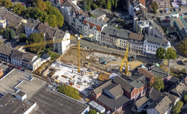 Aerial view, construction site and new building between Neumarkt and Schulstraße in Schwelm, Ruhr area, North Rhine-Westphalia, Germany, construction work, construction area, construction site, building plots, construction crane, construction project, construction site, DE, Europe, aerial view, aerial photography, aerial photography, new building, Schwelm, overview, bird's-eye view, overview