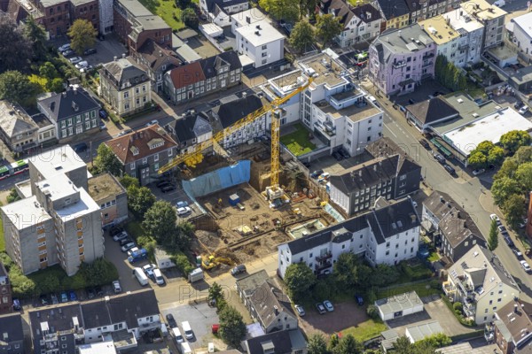 Aerial view, construction site and new building for Dorotheen-Hof in Weststraße in Schwelm, Ruhr area, North Rhine-Westphalia, Germany, construction work, construction area, construction site, building plots, construction crane, construction project, construction site, care and nursing, DE, Europe, aerial view, aerial photography, aerial photography, new building, care facility, Schwelm, overview, bird's eye view, living and care, birds-eyes view, overview