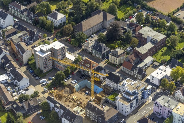 Aerial view, construction site and new building for Dorotheen-Hof in Weststraße in Schwelm, Ruhr area, North Rhine-Westphalia, Germany, construction work, construction area, construction site, building plots, construction crane, construction project, construction site, care and nursing, DE, Europe, aerial view, aerial photography, aerial photography, new building, care facility, Schwelm, overview, bird's eye view, living and care, birds-eyes view, overview