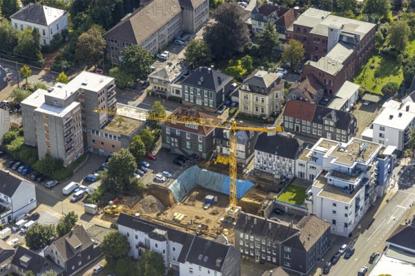 Aerial view, construction site and new building for Dorotheen-Hof in Weststraße in Schwelm, Ruhr area, North Rhine-Westphalia, Germany, construction work, construction area, construction site, building plots, construction crane, construction project, construction site, care and nursing, DE, Europe, aerial view, aerial photography, aerial photography, new building, care facility, Schwelm, overview, bird's eye view, living and care, birds-eyes view, overview