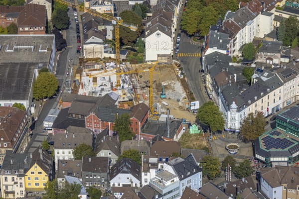 Aerial view, construction site and new building between Neumarkt and Schulstraße in Schwelm, Ruhr area, North Rhine-Westphalia, Germany, construction work, construction area, construction site, building plots, construction crane, construction project, construction site, DE, Europe, aerial view, aerial photography, aerial photography, new building, Schwelm, overview, bird's-eye view, overview