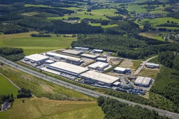 Aerial view, construction site in the Nicolaus-Otto-Straße industrial estate, Olpe town, Olpe, Sauerland, North Rhine-Westphalia, Germany, motorway A45, construction work, construction area, construction site, building site, construction project, construction site, DE, Europe, commercial enterprises, commercial area, commercial site, commercial use, industrial area, industrial site, aerial photograph, aerial photography, aerial photography, overview, bird's eye view, birds-eyes view, overview