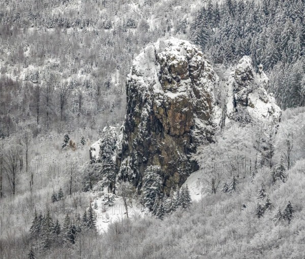 Aerial view of the rock formation Bruchhauser Steine a ground monument with four main rocks on the Istenberg in the Rothaargebirge in winter with snow in Bruchhausen in Olsberg in Sauerland in North Rhine-Westphalia, Germany, Sauerland, Europe, aerial view, birds-eyes view, aerial photography, aerial photography, overview, bird's eye view