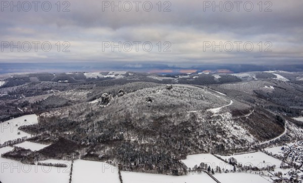 Aerial view of the rock formation Bruchhauser Steine a ground monument with four main rocks on the Istenberg in the Rothaargebirge in winter with snow in Bruchhausen in Olsberg in Sauerland in North Rhine-Westphalia, Germany, Sauerland, Europe, aerial view, birds-eyes view, aerial photography, aerial photography, overview, bird's eye view
