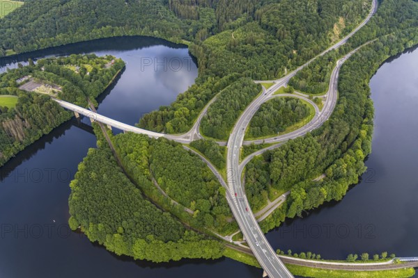 Aerial view, Biggesee, bridge Landesstraße L512, bridge Bundesstraße B54, Olpe-Stadt, Olpe, Sauerland, North Rhine-Westphalia, Germany, Biggetalsperre, bridge, Bundesstraße B54, DE, Europe, shapes and colours, hilly landscape, aerial view, aerial photography, aerial photography, nature park Ebbegebirge, lake, reservoir, overview, bird's eye view, forebay, birds-eyes view, overview