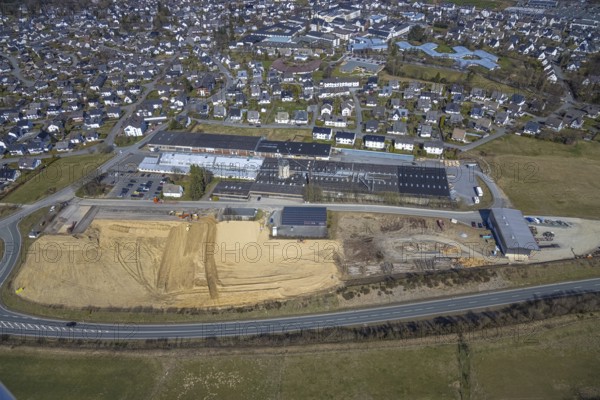 Aerial view, construction site at Körling GmbH, Hans-Körling-Straße, Bigge, Olsberg, Sauerland, North Rhine-Westphalia, Germany, construction area, construction site, building plots, construction project, construction site, DE, Europe, commercial enterprises, commercial area, commercial use, industrial area, industrial site, aerial photograph, aerial photography, aerial photography, overview, bird's-eye view, bird's-eye view, overview