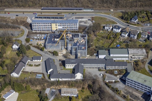 Aerial view, construction site at the vocational college Olsberg of the HSK, Olsberg railway station, Olsberg, Sauerland, North Rhine-Westphalia, Germany, railway station, construction work, construction area, construction site, construction project, construction site, education, educational institution, DE, Deutsche Bahn AG, Europe, main station, main railway station, college school, teaching institute, aerial view, aerial photography, aerial photography, school, overview, bird's-eye view, overview