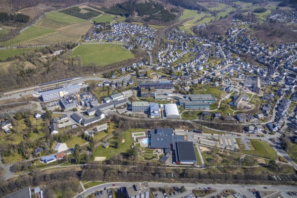 Aerial view, construction site at the vocational college Olsberg of the HSK, Olsberg railway station, Olsberg, Sauerland, North Rhine-Westphalia, Germany, railway station, construction work, construction area, construction site, construction project, construction site, education, educational institution, DE, Deutsche Bahn AG, Europe, main station, main railway station, college school, teaching institute, aerial view, aerial photography, aerial photography, school, overview, bird's-eye view, overview