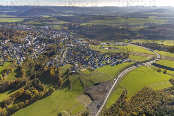 Aerial view, construction site and new construction of the bypass road L776n in the district Fredeburg in Schmallenberg, Sauerland, North Rhine-Westphalia, Germany, construction work, construction, construction area, building site, building plots, construction measure, construction project, construction site, DE, Europe, aerial view, aerial photography, aerial photography, new construction, Schmallenberg, road construction work, road construction measure, overview, bird's eye view, overview
