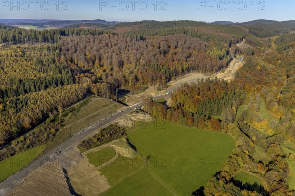 Aerial view, construction site and new construction of the bypass road L776n in the district Fredeburg in Schmallenberg, Sauerland, North Rhine-Westphalia, Germany, construction work, construction, construction area, building site, building plots, construction measure, construction project, construction site, DE, Europe, aerial view, aerial photography, aerial photography, new construction, Schmallenberg, road construction work, road construction measure, overview, bird's eye view, overview