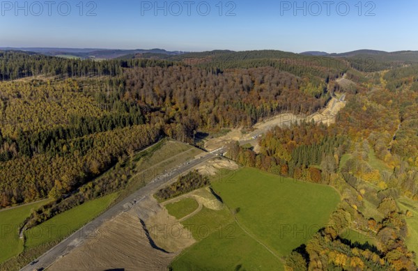 Aerial view, construction site and new construction of the bypass road L776n in the district Fredeburg in Schmallenberg, Sauerland, North Rhine-Westphalia, Germany, construction work, construction, construction area, building site, building plots, construction measure, construction project, construction site, DE, Europe, aerial view, aerial photography, aerial photography, new construction, Schmallenberg, road construction work, road construction measure, overview, bird's eye view, overview