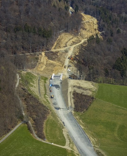 Aerial view, construction site and new construction of the L776n bypass Bad Fredeburg, Fredeburg, Schmallenberg, Sauerland, North Rhine-Westphalia, Germany, construction work, construction, construction area, building site, building plots, construction measure, construction project, construction site, bridge, DE, relief of the through road, Europe, property tax, real estate, state road L776n, aerial view, aerial photography, aerial photography, new construction, bypass, overview, bypass road, bird's eye view, forest area, residential area, housing and living, residential area, residential buildings, quality of living, birds-eyes view, overview