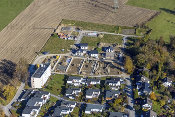 Aerial view, construction site and new construction of residential buildings on Breslauer Straße in Schmallenberg, Sauerland, North Rhine-Westphalia, Germany, construction work, construction area, building plots, construction project, construction site, DE, Europe, property tax, real estate, aerial view, aerial photography, aerial photography, new construction, Schmallenberg, overview, bird's eye view, residential complex, living and living, residential area, residential buildings, residential quality, residential neighbourhood, housing estate, birds-eyes view, overview