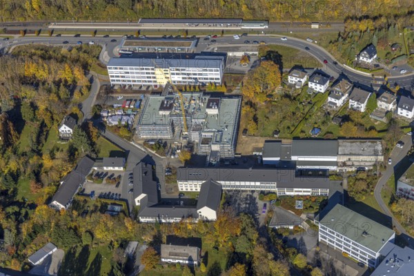 Aerial view, bus station and construction work at the vocational college Olsberg of the HSK in Olsberg, Sauerland, North Rhine-Westphalia, Germany, construction work, construction project, construction site, vocational college, vocational school, education, educational institution, bus station, bus stop, DE, Europe, educational institute, aerial view, aerial photography, aerial photography, Olsberg, bus station, school, overview, bird's eye view, ZOB, birds-eyes view, overview