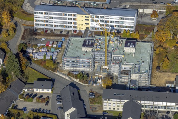 Aerial view, bus station and construction work at the vocational college Olsberg of the HSK in Olsberg, Sauerland, North Rhine-Westphalia, Germany, construction work, construction project, construction site, vocational college, vocational school, education, educational institution, bus station, bus stop, DE, Europe, educational institute, aerial view, aerial photography, aerial photography, Olsberg, bus station, school, overview, bird's eye view, ZOB, birds-eyes view, overview