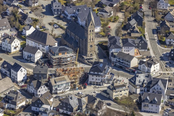 Aerial view, Construction site, New residential and commercial building Bahnhofstraße at the catholic parish church St. Nikolaus, Olsberg, Sauerland, North Rhine-Westphalia, Germany, place of worship, construction work, construction area, construction site, construction measure, construction project, construction site, DE, Europe, religious community, place of worship, property tax, real estate, capacity requirement, church, parish, denomination, aerial view, aerial photography, aerial photography, parish church, religion, overview, bird's eye view, living and working, living and life, residential area, birds-eyes view, overview