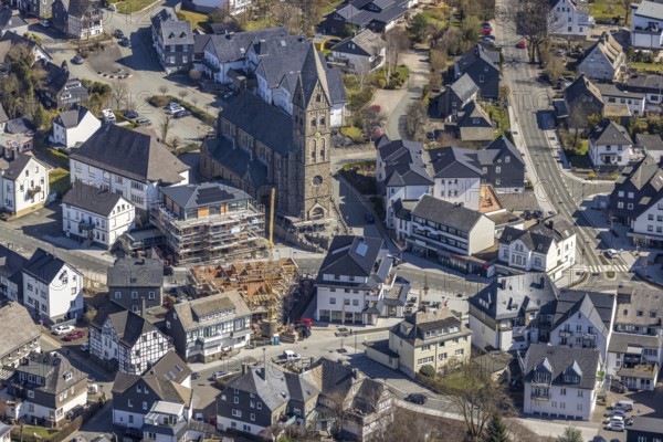 Aerial view, Construction site, New residential and commercial building Bahnhofstraße at the catholic parish church St. Nikolaus, Olsberg, Sauerland, North Rhine-Westphalia, Germany, place of worship, construction work, construction area, construction site, construction measure, construction project, construction site, DE, Europe, religious community, place of worship, property tax, real estate, capacity requirement, church, parish, denomination, aerial view, aerial photography, aerial photography, parish church, religion, overview, bird's eye view, living and working, living and life, residential area, birds-eyes view, overview