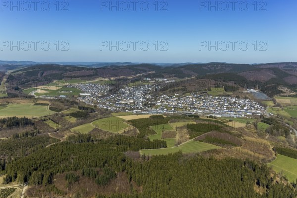 Aerial view, construction site and new construction of the bypass L776n Bad Fredeburg, Fredeburg, Schmallenberg, Sauerland, North Rhine-Westphalia, Germany, construction work, construction, construction area, building site, building plots, construction project, construction site, bridge, DE, relief of the through road, Europe, long-distance view, property tax, real estate, state road L776n, aerial view, aerial photography, aerial photography, new construction, bypass, terraced houses, overview, bypass road, bird's-eye view, forest area, residential area, housing and living, residential area, residential buildings, quality of living, birds-eyes view, overview