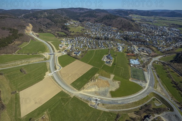 Aerial view, construction site and new construction of the L776n bypass Bad Fredeburg, Fredeburg, Schmallenberg, Sauerland, North Rhine-Westphalia, Germany, construction work, construction, construction area, building site, building plots, construction measure, construction project, construction site, bridge, DE, relief of the through road, Europe, property tax, real estate, state road L776n, aerial view, aerial photography, aerial photography, new construction, bypass, overview, bypass road, bird's eye view, forest area, residential area, housing and living, residential area, residential buildings, quality of living, birds-eyes view, overview
