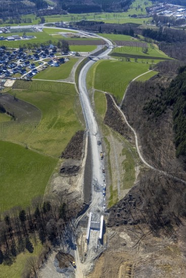 Aerial view, construction site and new construction of the L776n bypass Bad Fredeburg, Fredeburg, Schmallenberg, Sauerland, North Rhine-Westphalia, Germany, construction work, construction, construction area, building site, building plots, construction measure, construction project, construction site, bridge, DE, relief of the through road, Europe, property tax, real estate, state road L776n, aerial view, aerial photography, aerial photography, new construction, bypass, overview, bypass road, bird's eye view, forest area, residential area, housing and living, residential area, residential buildings, quality of living, birds-eyes view, overview