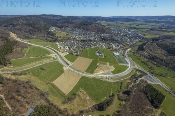 Aerial view, construction site and new construction of the L776n bypass Bad Fredeburg, Fredeburg, Schmallenberg, Sauerland, North Rhine-Westphalia, Germany, construction work, construction, construction area, building site, building plots, construction measure, construction project, construction site, bridge, DE, relief of the through road, Europe, property tax, real estate, state road L776n, aerial view, aerial photography, aerial photography, new construction, bypass, overview, bypass road, bird's eye view, forest area, residential area, housing and living, residential area, residential buildings, quality of living, birds-eyes view, overview