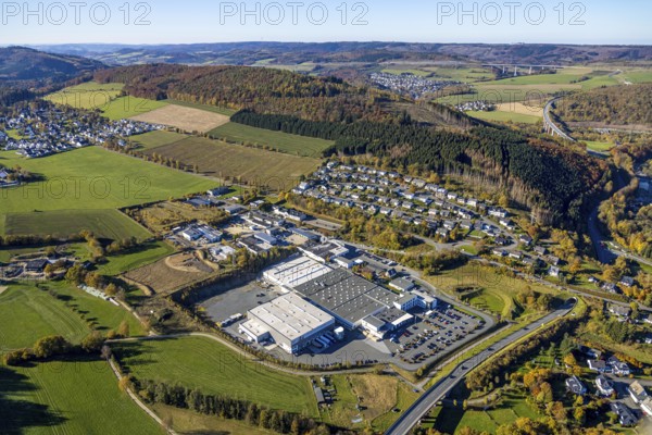 Aerial view, construction area in the industrial estate Zum Hohlen Morgen in the district of Bigge in Olsberg, Sauerland, North Rhine-Westphalia, Germany, construction area, construction site, building plots, DE, Europe, commercial enterprises, commercial area, commercial park, commercial site, commercial use, industrial area, industrial site, aerial photograph, aerial photography, aerial photography, Olsberg, overview, bird's eye view, birds-eyes view, overview