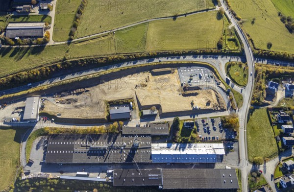 Aerial view, new development area Bottschüre-Süd with feeder road B480 in the district Bigge in Olsberg, Sauerland, North Rhine-Westphalia, Germany, construction work, construction area, building site, building plots, construction project, construction site, DE, Europe, aerial view, aerial photography, aerial photography, new construction, Olsberg, overview, bird's-eye view, overview