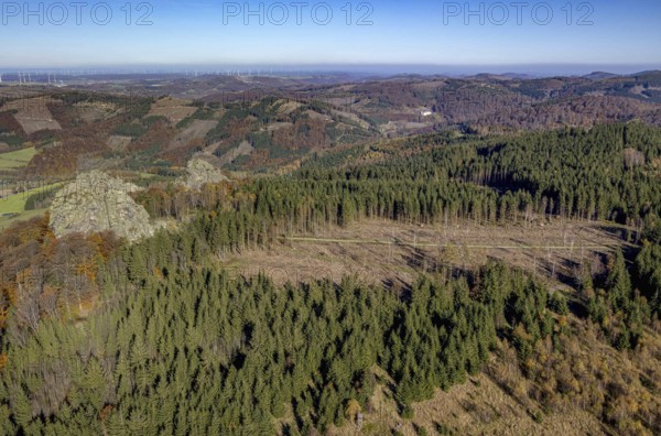 Aerial view, autumn forest and forest damage and Bruchhauser Steine in the district Bruchhausen in Olsberg, Sauerland, North Rhine-Westphalia, Germany, tree dieback, bark beetle damage, bark beetle plague, DE, Europe, spruce dieback, geotope with rock formations, clear-cutting, landscape conservation area, aerial view, aerial photography, aerial photography, nature reserve, Olsberg, overview, bird's eye view, forest, forest damage, forest dieback, birds-eyes view, overview