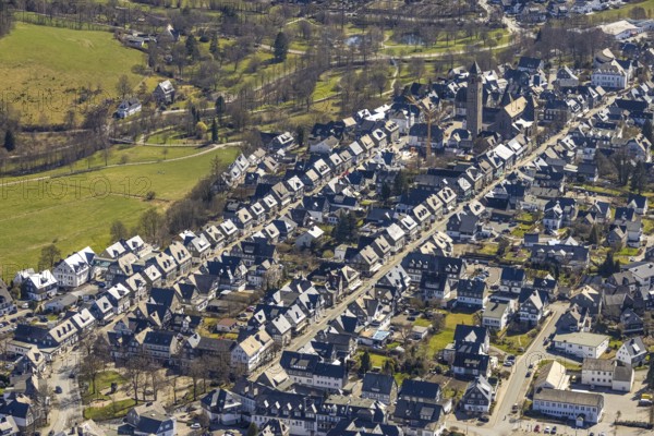 Aerial view, housing estate Weststraße and Oststraße Parallele, St.-Alexander-Kirche, Schützenplatz, Schmallenberg, Sauerland, North Rhine-Westphalia, Germany, place of worship, DE, Europe, religious community, place of worship, property tax, holy place, real estate, church, parish, denomination, aerial photograph, aerial photography, aerial photography, parallel streets, religion, religious site, overview, bird's-eye view, residential area, living and life, residential area, residential buildings, quality of life, residential neighbourhood, housing estate, birds-eyes view, overview