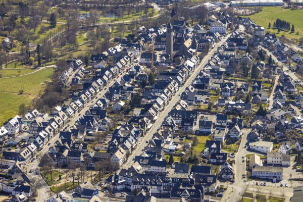 Aerial view, housing estate Weststraße and Oststraße Parallele, St.-Alexander-Kirche, Schützenplatz, Schmallenberg, Sauerland, North Rhine-Westphalia, Germany, place of worship, DE, Europe, religious community, place of worship, property tax, holy place, real estate, church, parish, denomination, aerial photograph, aerial photography, aerial photography, parallel streets, religion, religious site, overview, bird's-eye view, residential area, living and life, residential area, residential buildings, quality of life, residential neighbourhood, housing estate, birds-eyes view, overview