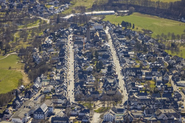 Aerial view, housing estate Weststraße and Oststraße Parallele, St.-Alexander-Kirche, Schützenplatz, Schmallenberg, Sauerland, North Rhine-Westphalia, Germany, place of worship, DE, Europe, religious community, place of worship, property tax, holy place, real estate, church, parish, denomination, aerial photograph, aerial photography, aerial photography, parallel streets, religion, religious site, overview, bird's-eye view, residential area, living and life, residential area, residential buildings, quality of life, residential neighbourhood, housing estate, birds-eyes view, overview