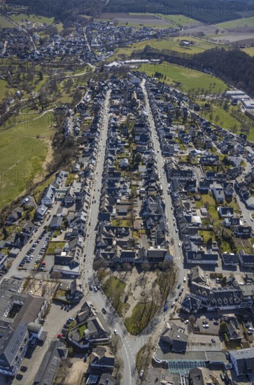 Aerial view, housing estate Weststraße and Oststraße Parallele, St.-Alexander-Kirche, Schützenplatz, Schmallenberg, Sauerland, North Rhine-Westphalia, Germany, place of worship, DE, Europe, religious community, place of worship, property tax, holy place, real estate, church, parish, denomination, aerial photograph, aerial photography, aerial photography, parallel streets, religion, religious site, overview, bird's-eye view, residential area, living and life, residential area, residential buildings, quality of life, residential neighbourhood, housing estate, birds-eyes view, overview