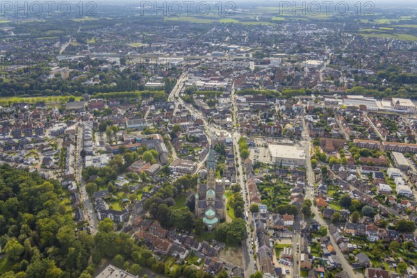 Aerial view, local view and the catholic church St. Antonius-Basilika in Rheine-Stadt in Rheine, Münsterland, North Rhine-Westphalia, Germany, place of worship, DE, Europe, religious community, place of worship, holy place, church, parish, denomination, aerial view, aerial photography, aerial photography, religion, religious site, Rheine, overview, bird's eye view, birds-eyes view, neo-Romanesque church building, overview