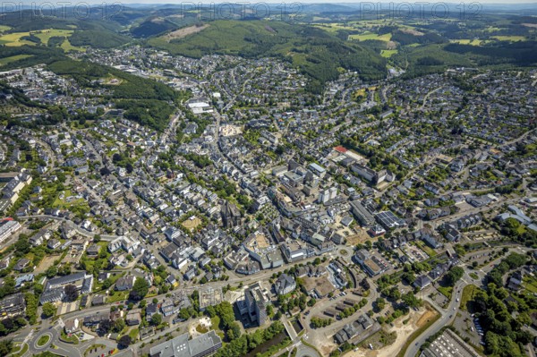 Aerial view, city centre view, town hall, St. Martinus Church, Olpe city, Olpe, Sauerland, North Rhine-Westphalia, Germany, old railway station, place of worship, authority, DE, Europe, health care, religious community, place of worship, holy place, hospital, church, church community, clinic, clinic centre, denomination, hospital, hospital, aerial view, aerial photography, aerial photography, medical facility, medical aid, religion, religious site, St. Martinus-Hospital, overview, bird's-eye view, birds-eyes view, overview, medical care